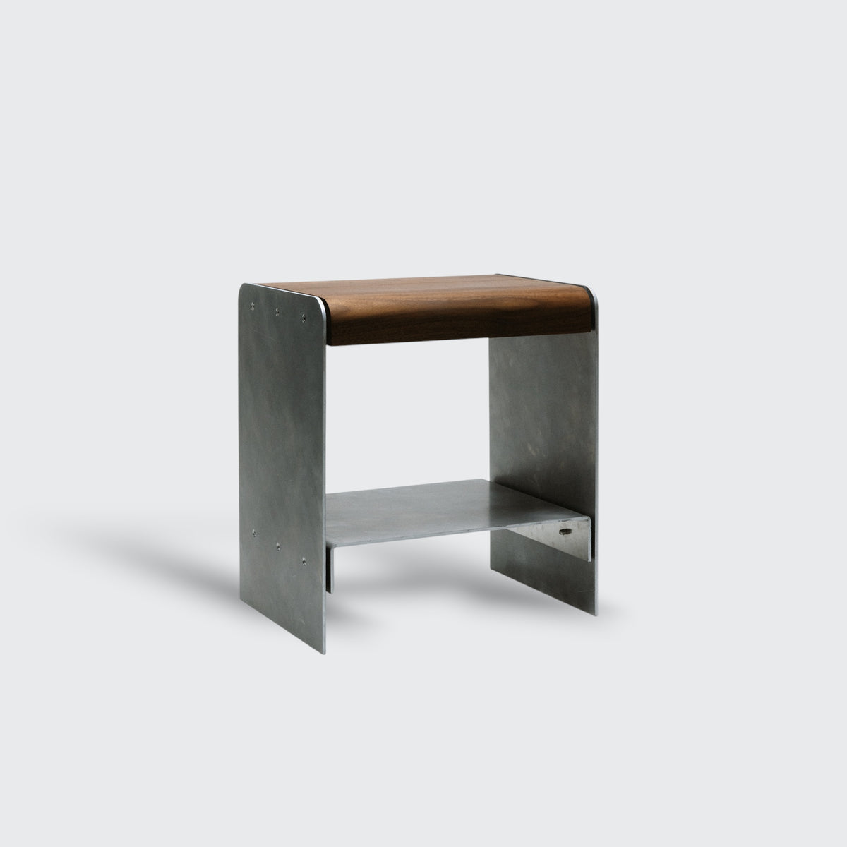 Hand-brushed and waxed aluminum stool